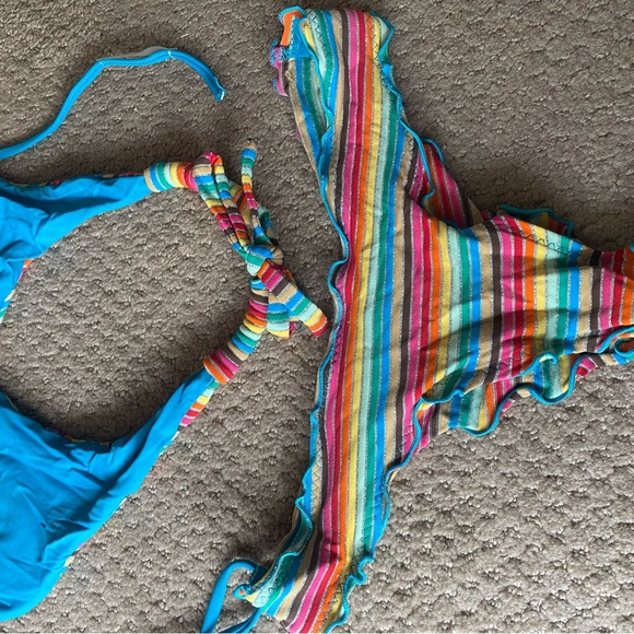 Size small vitamin A swimsuit. Top is reversible to a royal blue. - Picture 2 of 3